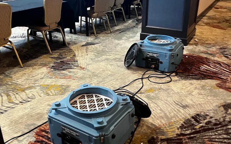 Hotel conference room being dried and restored after an event