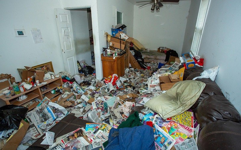 Room being cleared and organized during a hoarding cleanup