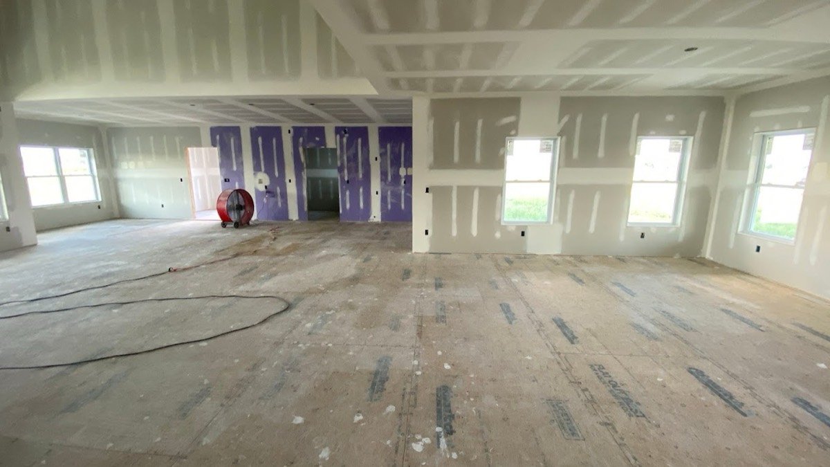 Interior of a new build being cleaned after construction