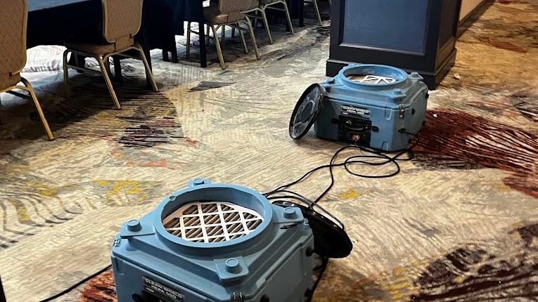 Hotel conference room being dried and restored after an event