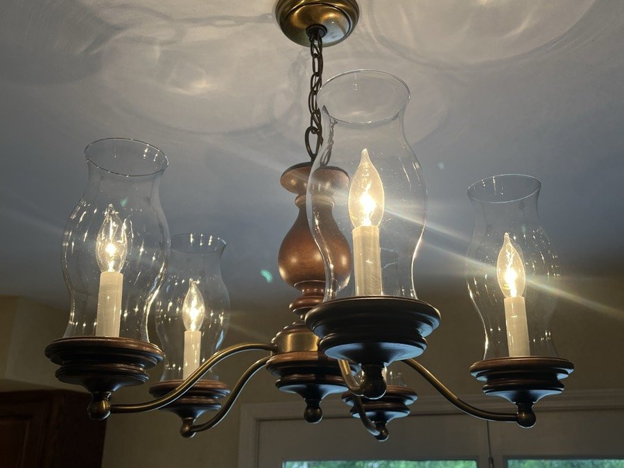 Chandelier detailed, glass shades left clear